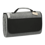 A grey oversized picnic rug with a handle, featuring a black pocket and a logo on the side.