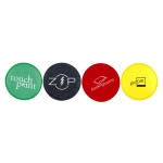 Four circular Frisbees in green, black, red, and yellow, each featuring a different logo or branding element.
