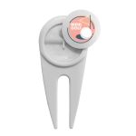 A white plastic golf divot repairer featuring a round top with a logo design.