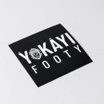 A square gloss paper sticker featuring a black background with white text and a logo.