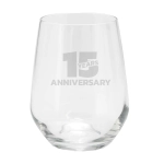 A stemless glass cup with a clear design, featuring a logo and a celebratory inscription for an anniversary.