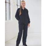 A navy track jacket featuring yellow accents, styled for kids, paired with matching trousers.