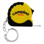 A miniature tape measure in yellow and black, featuring a keychain attachment and a branded logo.