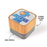 A bamboo Bluetooth speaker featuring a colorful logo and flashing lights, with music controls on the side.