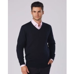 A men's 100% Merino wool V-neck long-sleeve sweater in navy, featuring a fitted design and worn over a light pink shirt.