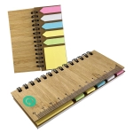 A bamboo sticky note holder with multiple sticky flags in pink, green, and yellow, featuring a ruler on the front.