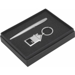 A silver pen, a metal keyring in the shape of a house, and a gift box with a black interior.