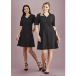 A black extended short sleeve dress displayed on two models, featuring a V-neck and a flared silhouette, with a logo visible.