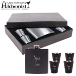 A drink bottle and four shot glasses in a gift box, featuring silver and black colours with a logo.