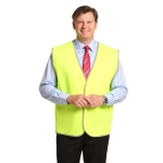 A Hi-Vis safety vest in bright yellow, featuring reflective trim, worn by a man in a collared shirt and tie.