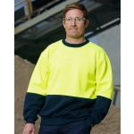 A Hi-Vis two tone safety windcheater in bright yellow and navy, worn by a man with safety glasses.