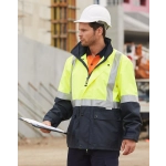 Hi-Vis two-tone rainproof safety jacket in yellow and navy, featuring 3M reflective tape, worn by a worker with a hard hat.