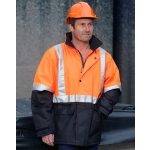 A hi-vis orange and black quilted safety jacket with reflective strips, worn by a person in an orange hard hat.