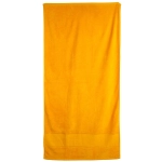 A bright yellow terry velour beach towel, measuring 75x150 cm, featuring a simple design and a logo.