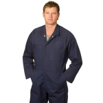 A man wearing a navy blue cotton drill coverall with multiple pockets and a logo.