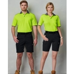 A pair of models wearing bright green polo shirts and black Rip-Stop Poly/Cotton Stretch Work Shorts.