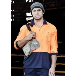 A man wearing an orange and navy blue long sleeve polo shirt, holding a work bag and wearing a grey beanie.