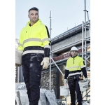 A high visibility yellow hoodie with black stripes, worn by two men on a construction site, featuring a logo.