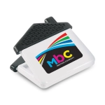 A white magnetic clip shaped like a house with a black top and a logo. Suitable for office use.
