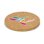 A round cork coaster featuring a colourful hummingbird design and a logo. The base is a natural cork colour.
