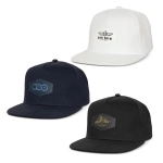 Three caps in white, navy, and black, each featuring distinct patches and logos on the front.