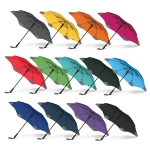 A collection of BLUNT Classic Umbrellas in various colours, including grey, yellow, red, green, blue, and purple, with logos.