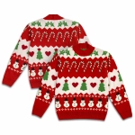 A red and white knitted jumper featuring Christmas motifs like snowmen, trees, hearts, and candy canes. It has a logo.