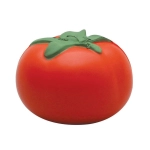 A red stress ball shaped like a tomato with a green stem and leaf on top. It has a smooth texture and a rounded shape.