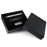 A black gift set containing a silver pen, a USB drive, and a black flash drive, presented in a sleek box.