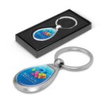 A Drop Metal Key Ring featuring a colorful teardrop design in a presentation box.