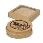 A round set of four natural cork coasters featuring a fish design, packaged in a simple box.